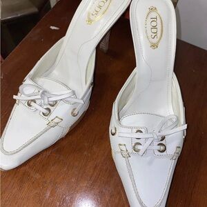 Tod’s White leather mules with gold accents 8